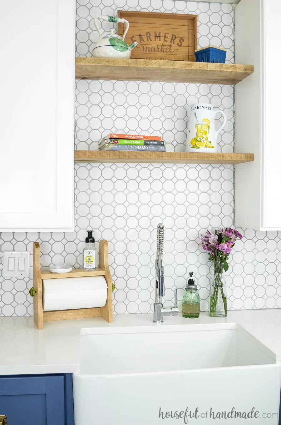 DIY farmhouse paper towel holder shown with farmers market tray on shelves