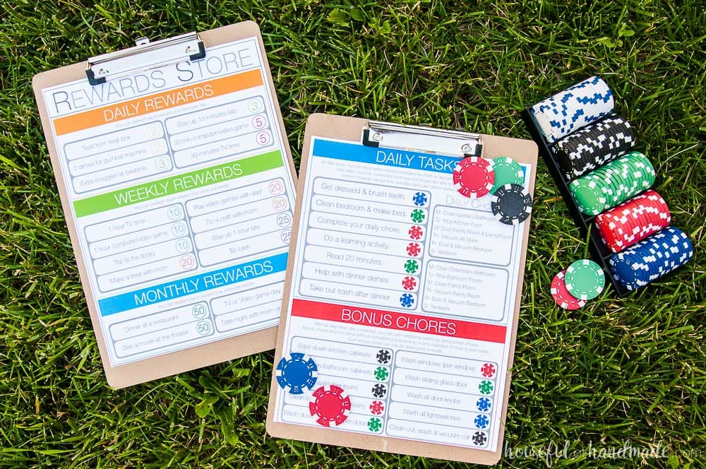 free printable kids chore chart shown on clipboard with colorful coins on grass