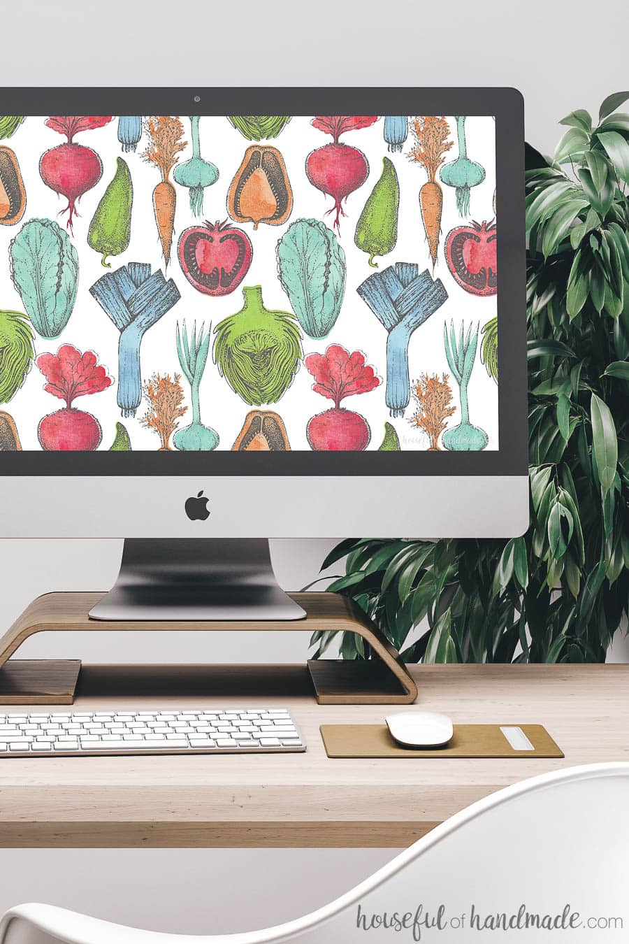 Bring the farmers market to your screens with these beautiful free digital backgrounds for August. The watercolor vegetable pattern is the perfect way to decorate your electronics for the last days of summer. #digitalbackground #digitalwallpaper #vegetableart #freedownload Desktop computer screen decorated with free digital wallpaper. The colorful watercolor produce design is reminiscent of summer farmers markets.