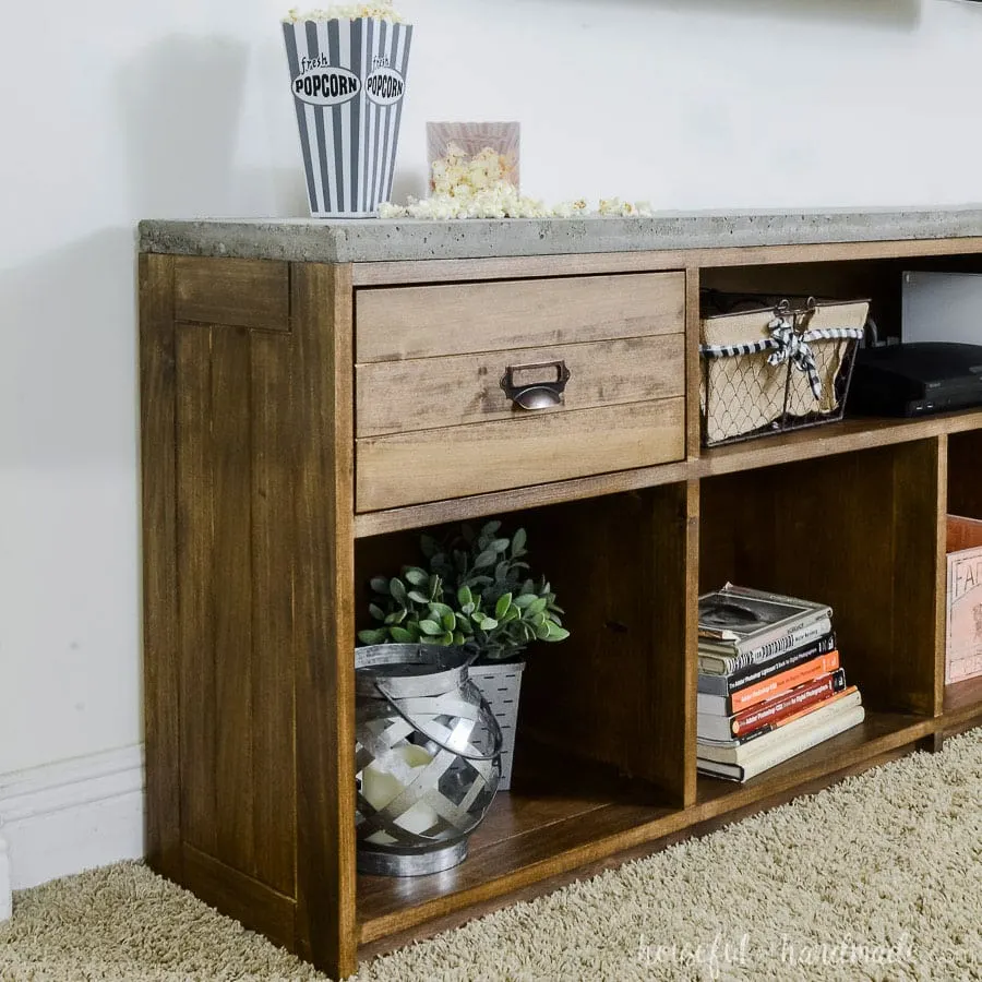 Rustic TV stand side view of the routered details on the boards.