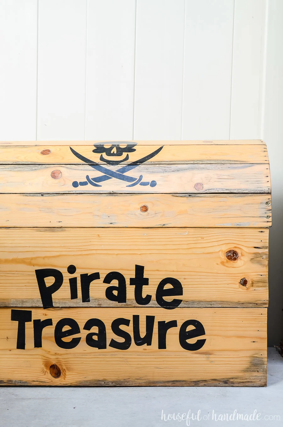 Homemade pirate treasure chest is the perfect outdoor toy box for the kids outdoor living spaces. 