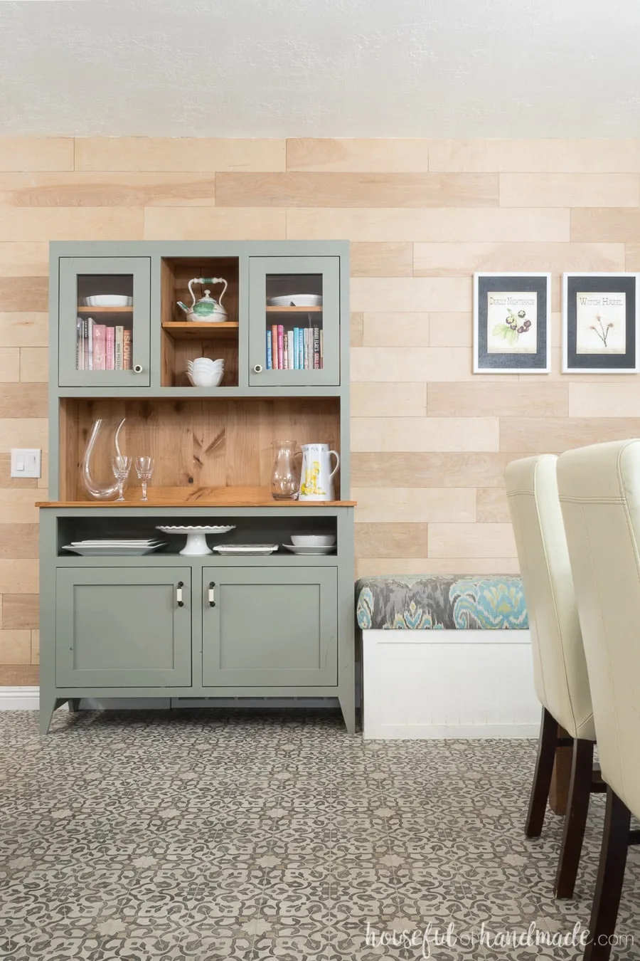 Dining room with patterned vinyl flooring, built in bench, and 4' wide gray rustic dining room hutch. 