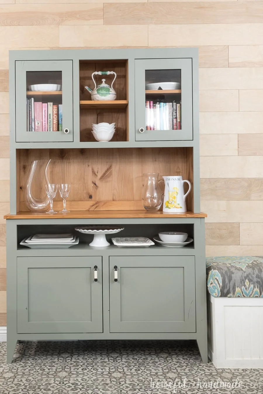 Gorgeous gray dining room hutch with natural knotty wood in the inside. Lots of storage and display space.
