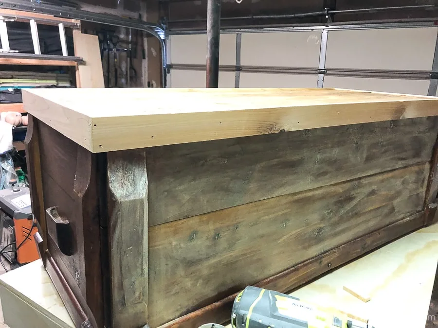For our upcycled chest to coffee table, a trim piece was added to the base to butt up against the cut legs. 