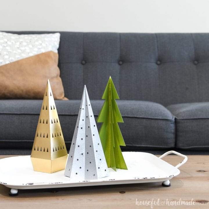 Tray of paper Christmas trees used to decorate with paper Christmas decor.