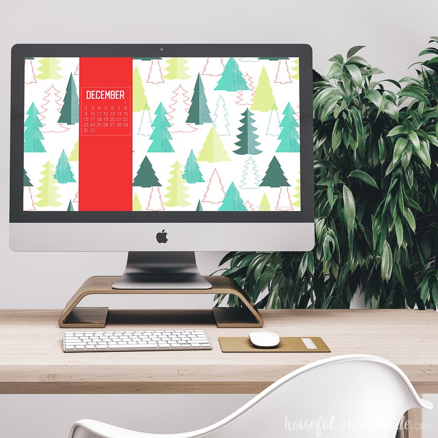 iMac computer with Christmas pattern free digital backgrounds for December on it.
