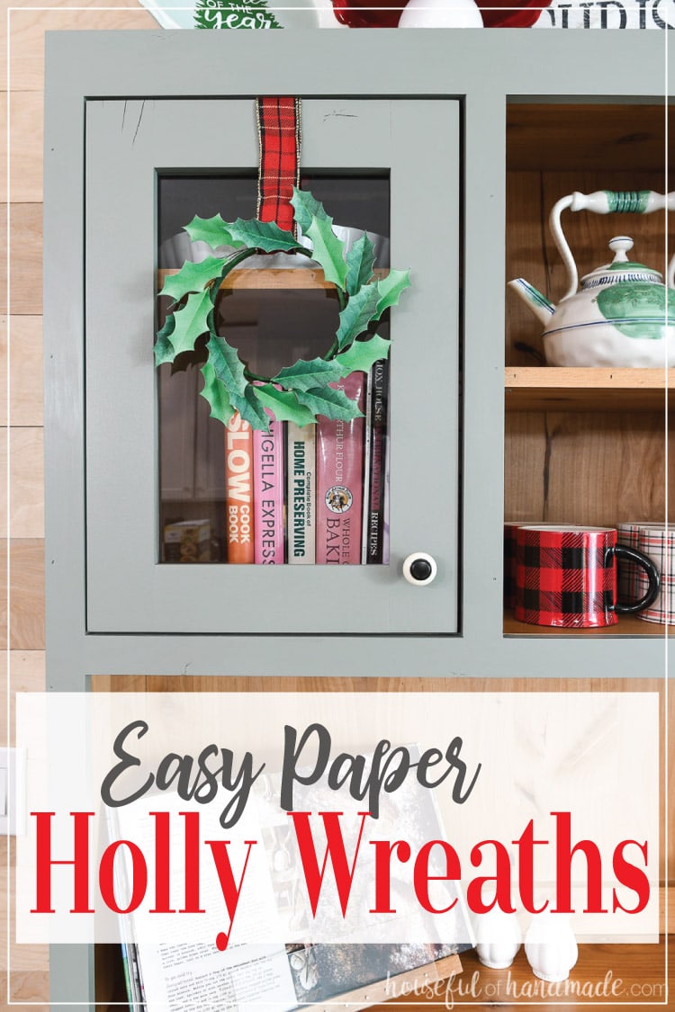 Save lots of money this Christmas by decorating with these beautiful paper Christmas wreaths. The simple paper holly wreaths are perfect for adding holiday decor to any surface. Decorate your kitchen cabinets, bookcases, mirrors, and more for Christmas. Housefulofhandmade.com | #christmas #papercrafts #paperdecor #wreath