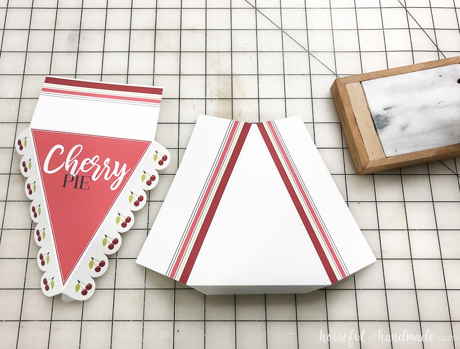 The two pieces of the printable leftover pie boxes template cut out and folded along the dotted lines.