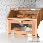 DIY bread box full of artisan bread.
