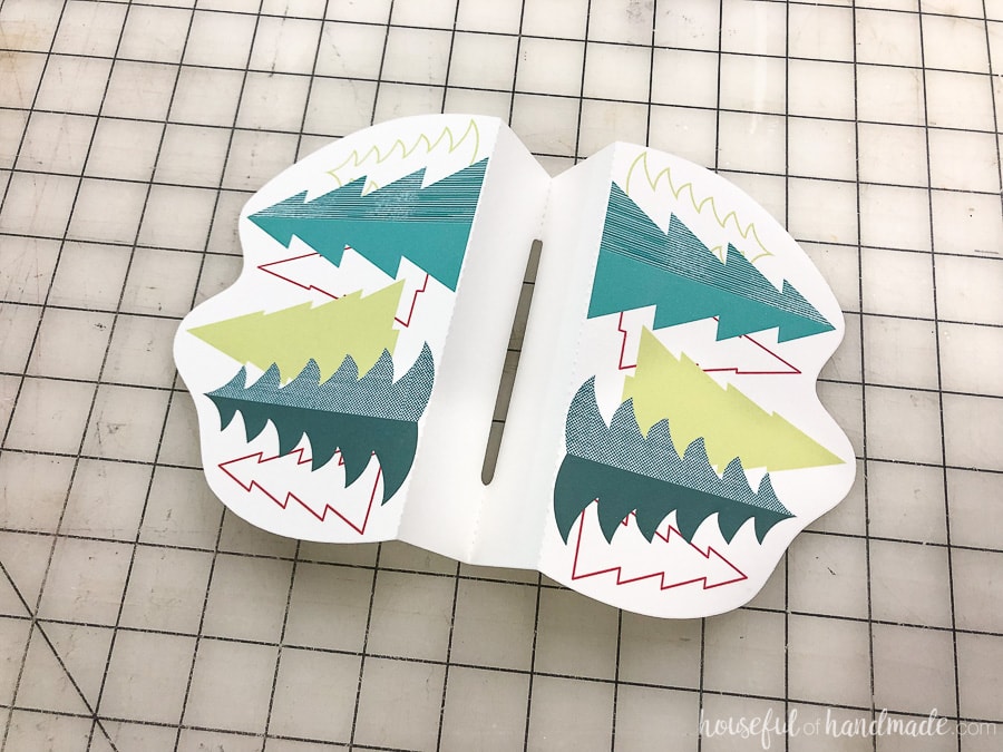 Cut out Christmas gift card holder with folds along all the dotted lines. 