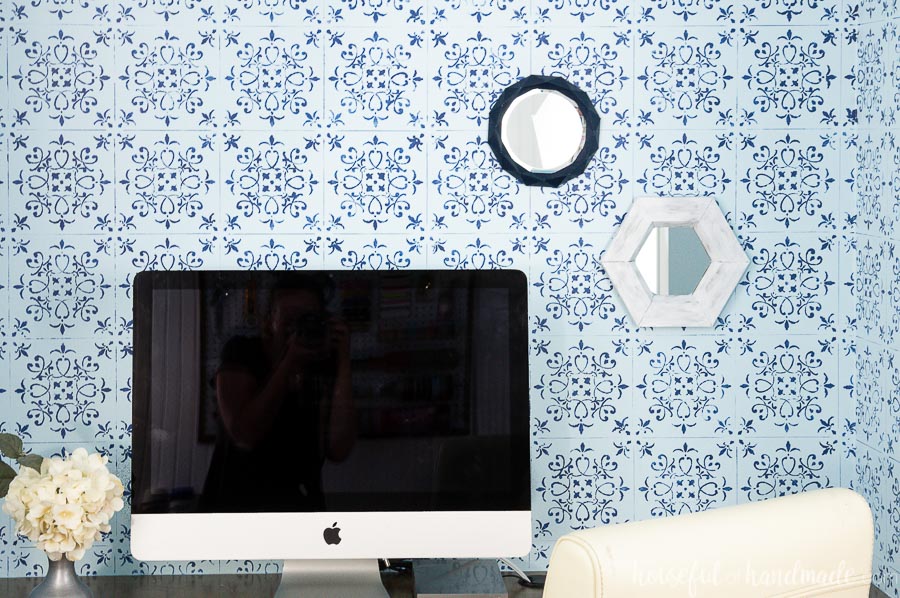 View of the entire desk area with the DIY wall mirrors hanging on the feature wall. 