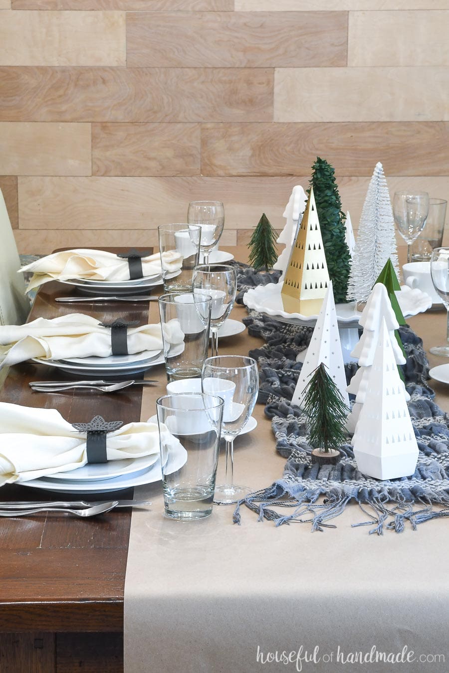 A winter table decorated with left-over Christmas decorations made from paper.