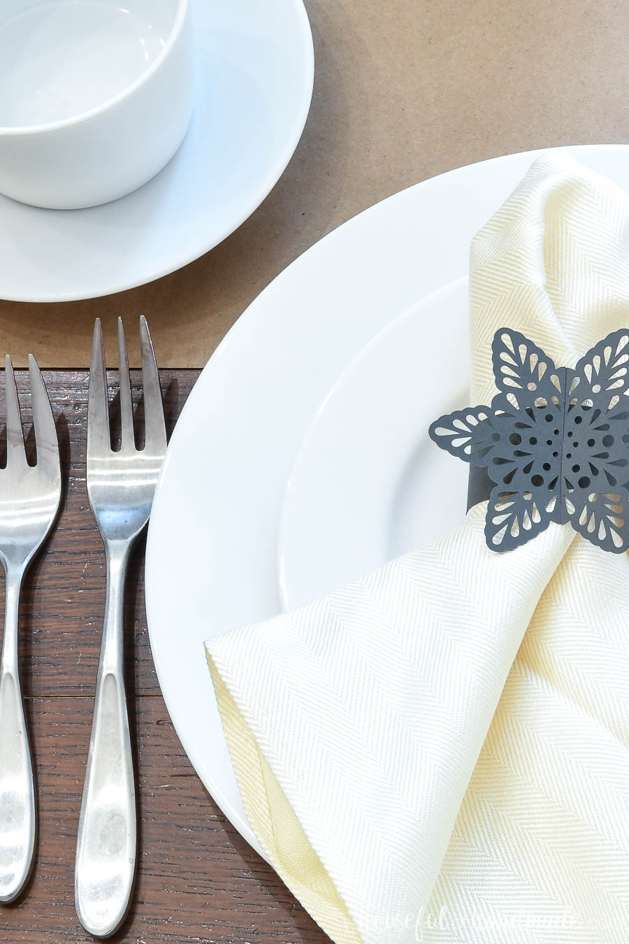 Close-up view of the snowflake napkin rings made out of paper.