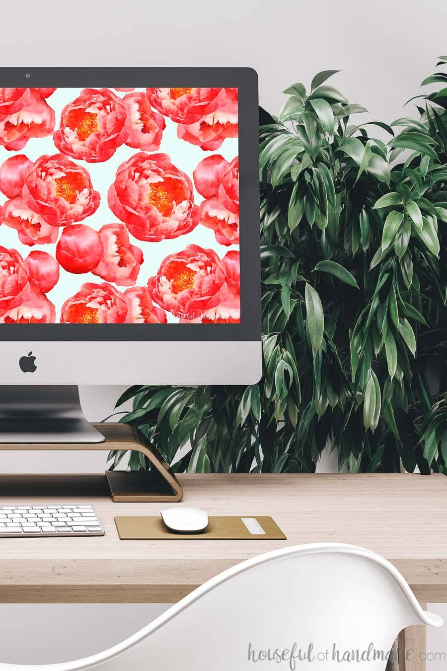 iMac computer with bold peony digital wallpaper as the free digital background for March.