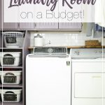 Laundry room remodeled on a budget with purple cabinets and stenciled floor.