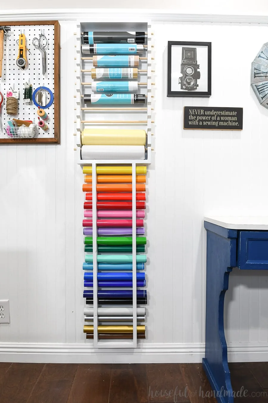 Vertical shot of the entire vinyl roll storage hanging on the wall and filled with vinyl. 