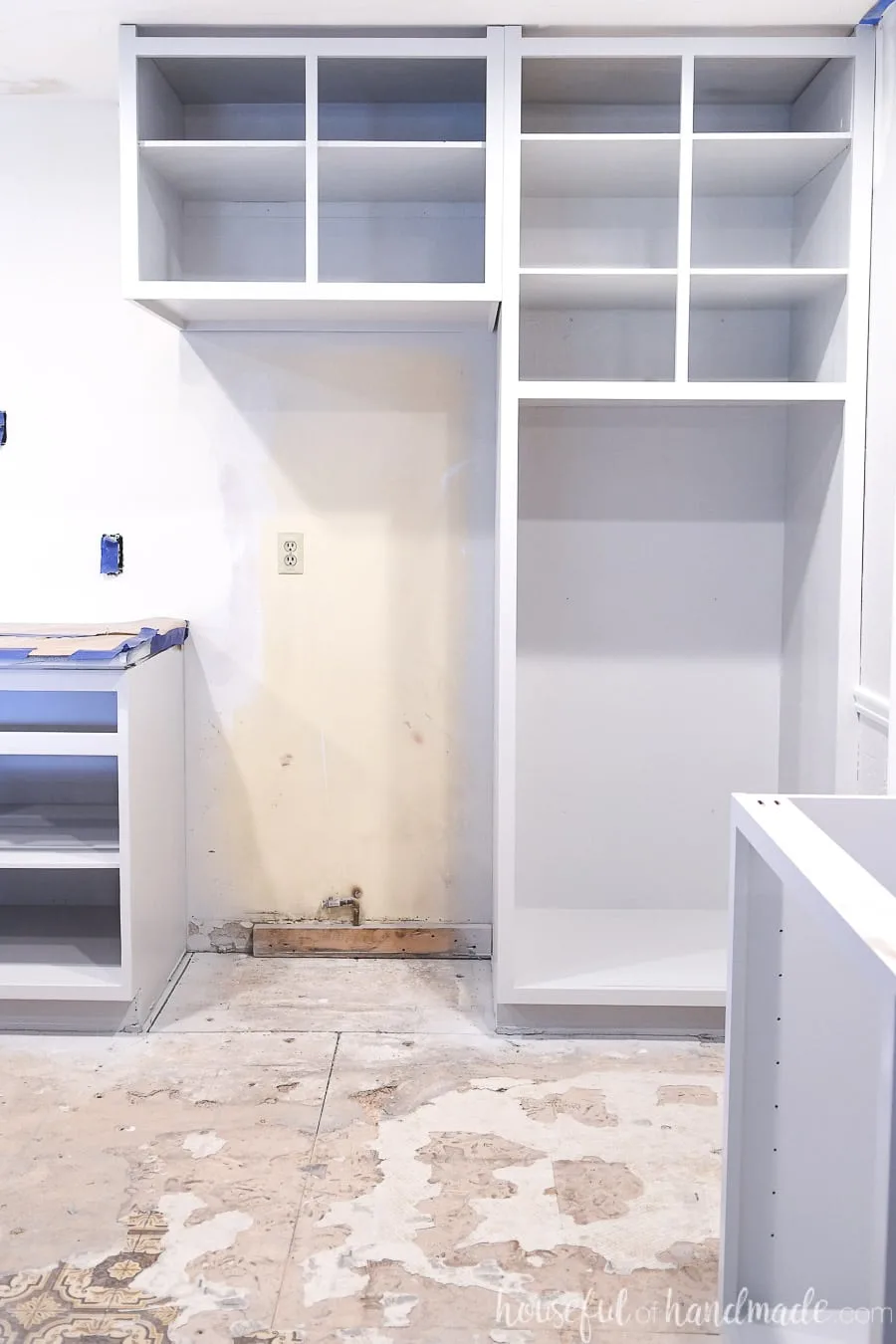 Pantry and over fridge cabinet painted with a paint sprayer.