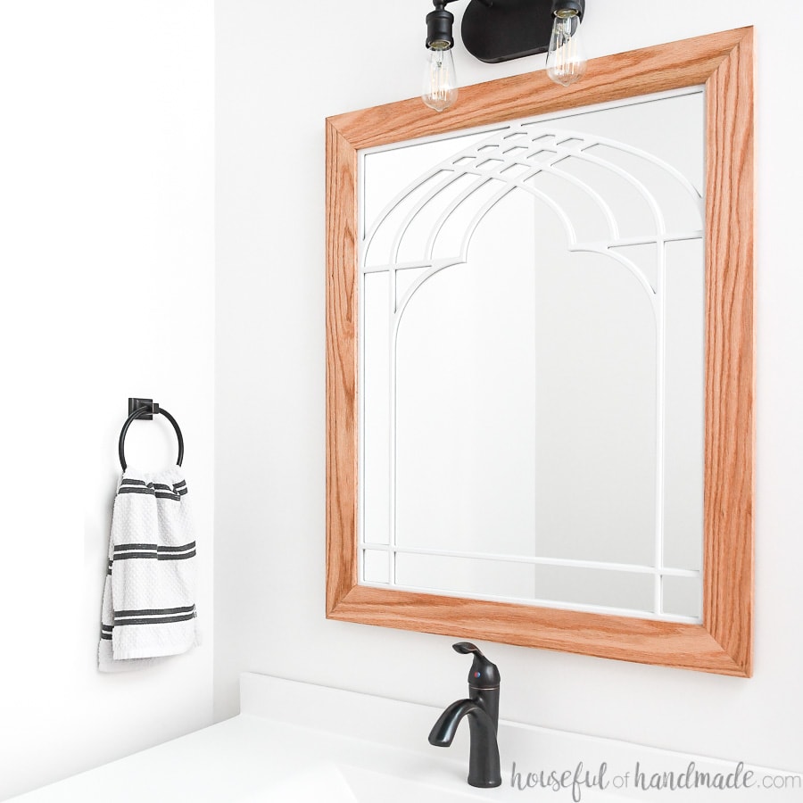 DIY Window frame mirror in bathroom above the vanity.