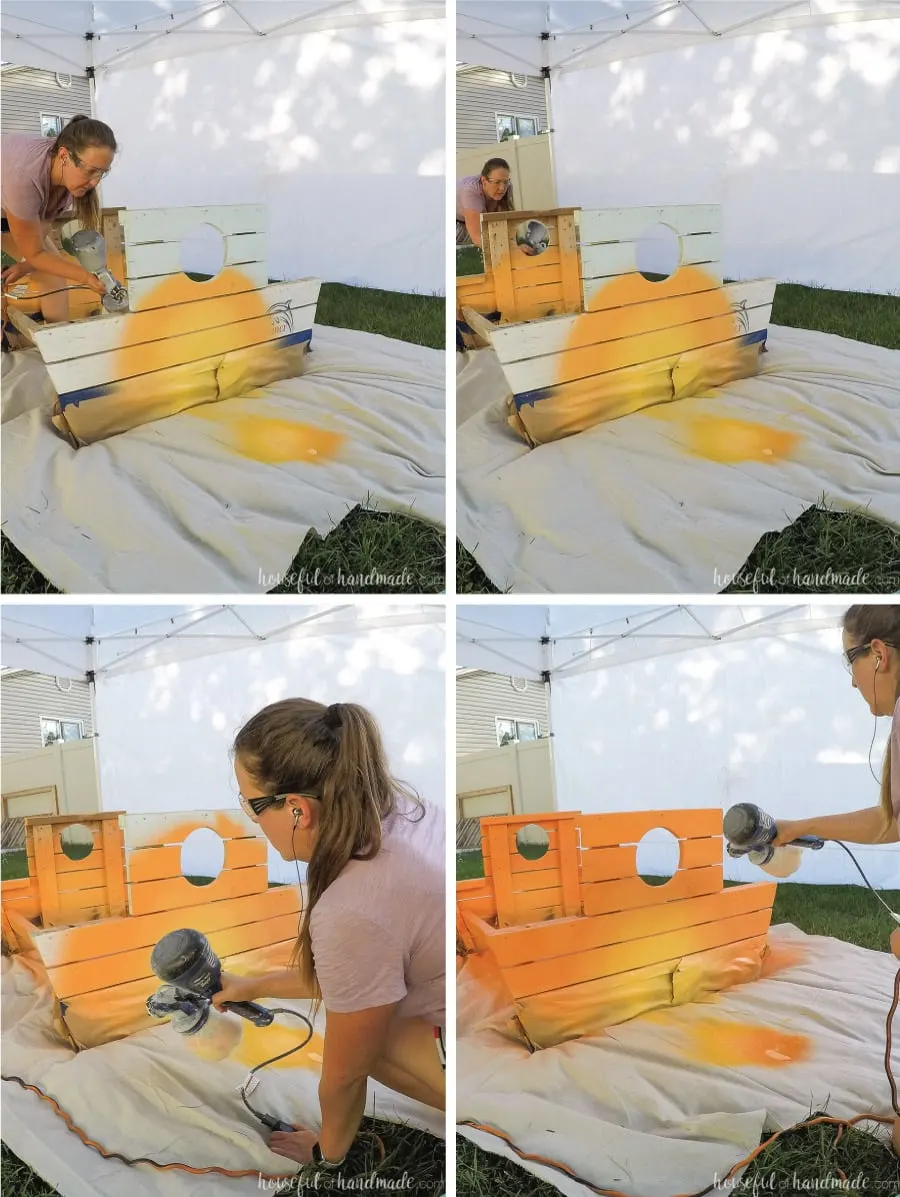 Painting the ombre sunset on the kids picnic table with the paint sprayer.