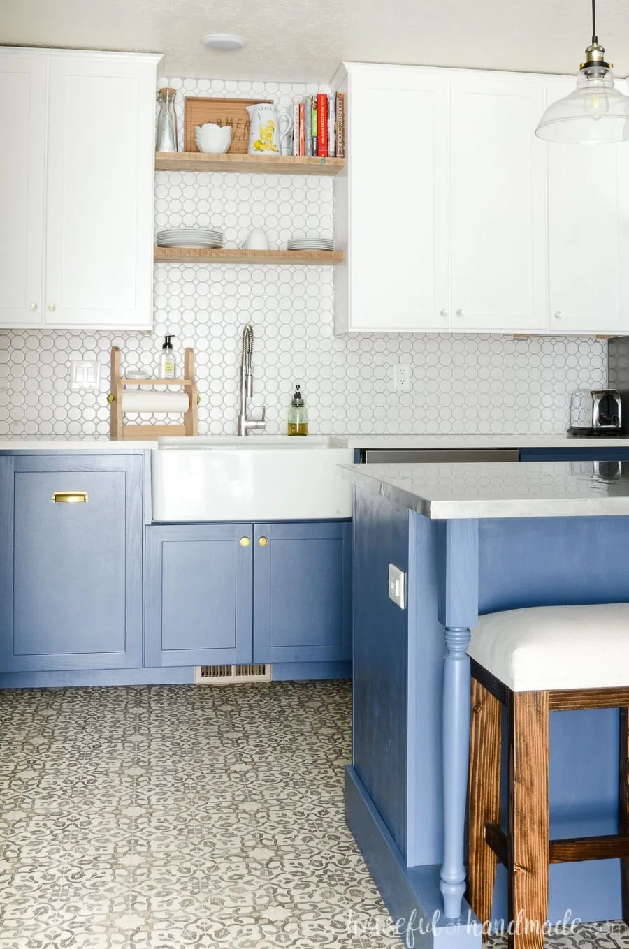 Kitchen with face frame cabinets installed with 1 1/4" overlay hinges.