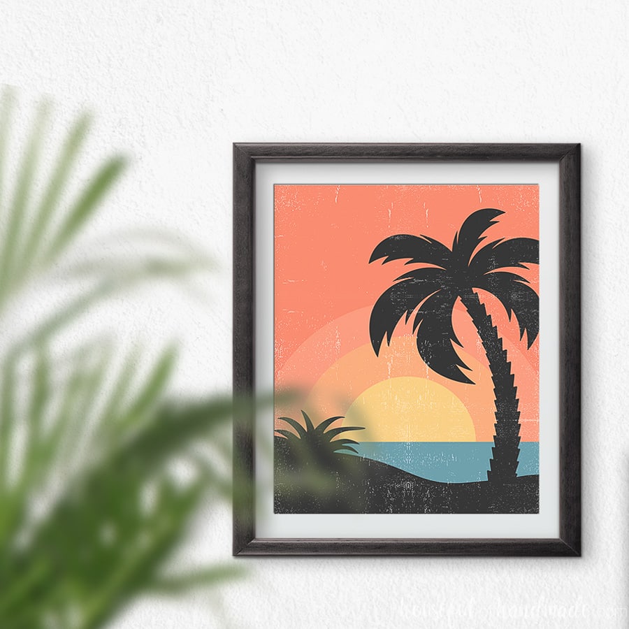 Retro beach art of a sunset with palm trees and bold colors. 