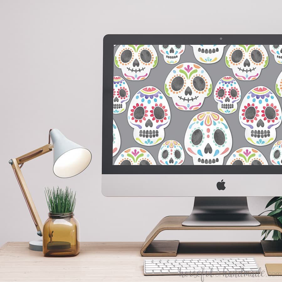 Desktop computer with the free digital wallpaper for October on the screen.