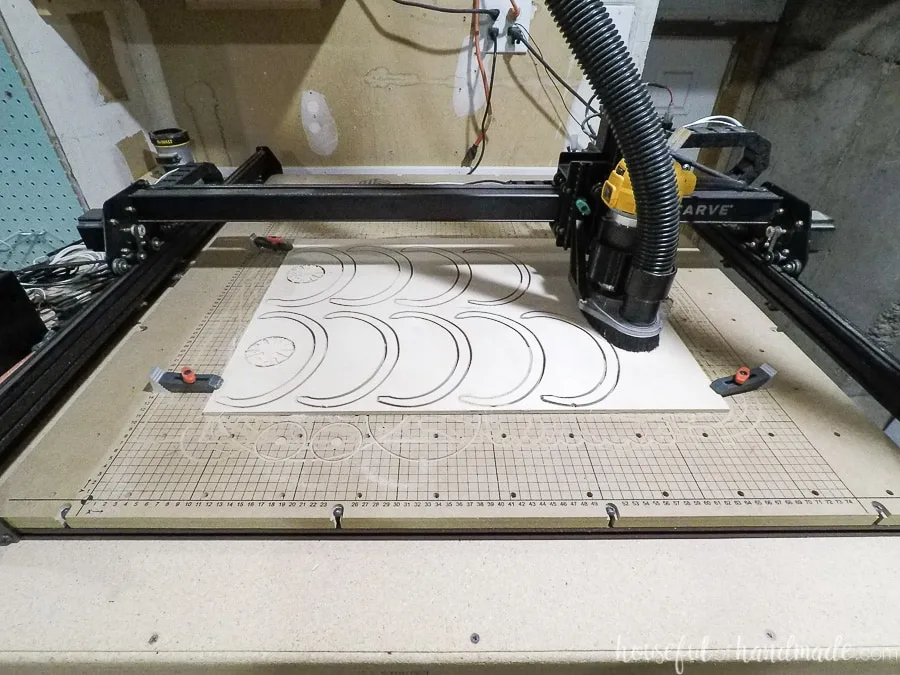 Wood pumpkin pieces being cut out with X-carve CNC machine.