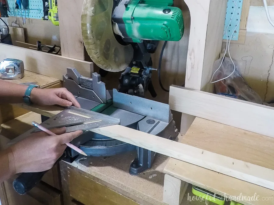 Measuring angled cuts to make on the miter saw for making the plant stands. 