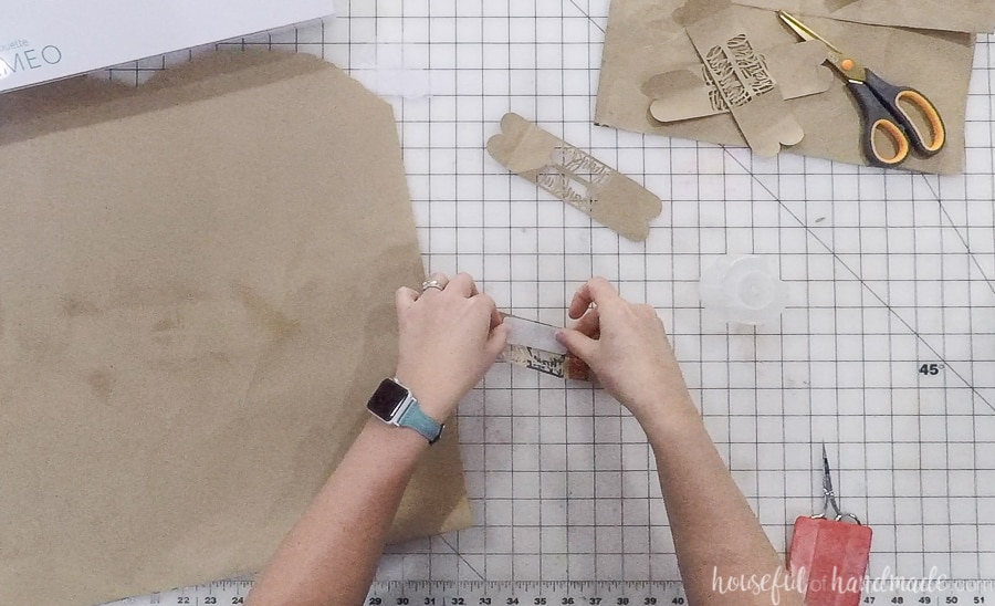 Inserting the vellum in between the design.