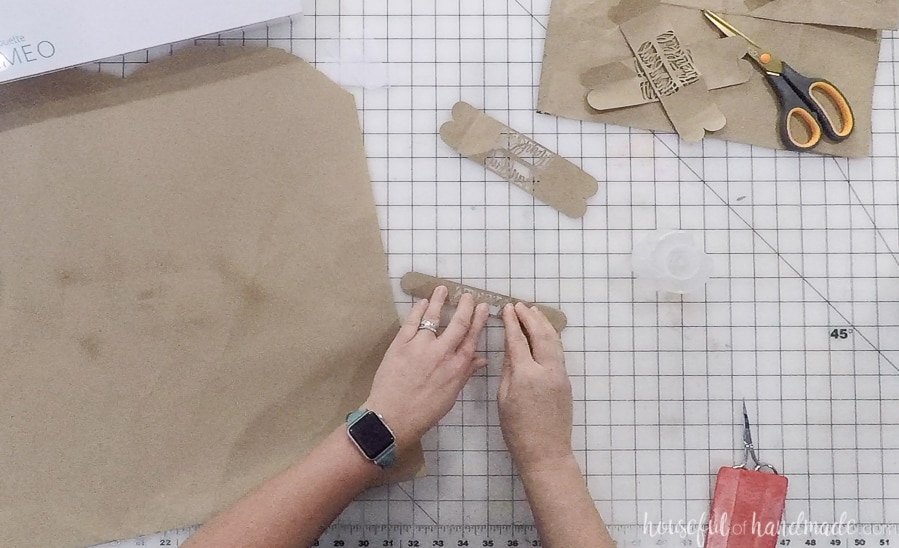 Pressing the thankful designed napkin rings together.