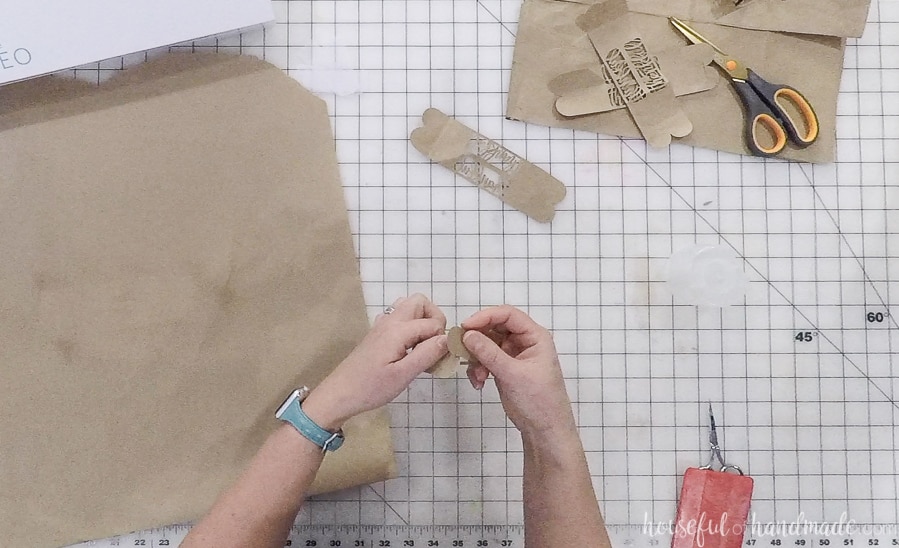 Securing the back of the DIY napkin rings.