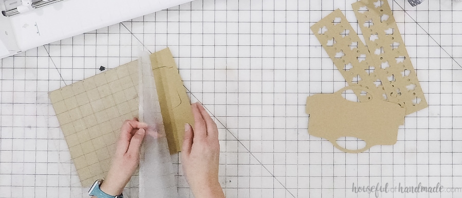 Removing the cut paper from the cutting mat.