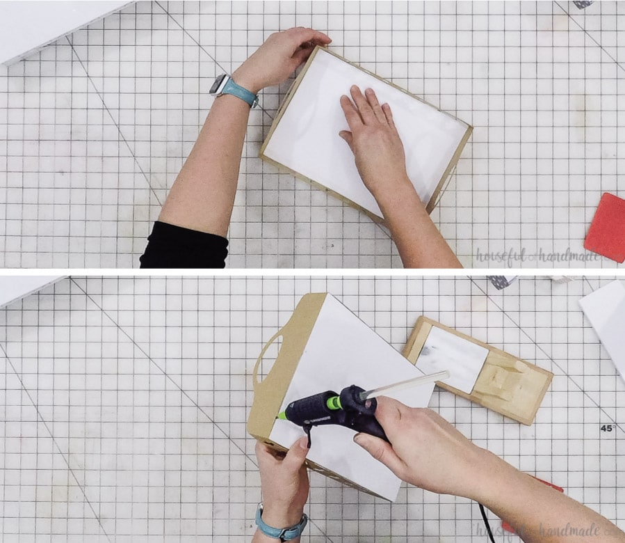 Glueing the sides of the cookie tray to the foam board.