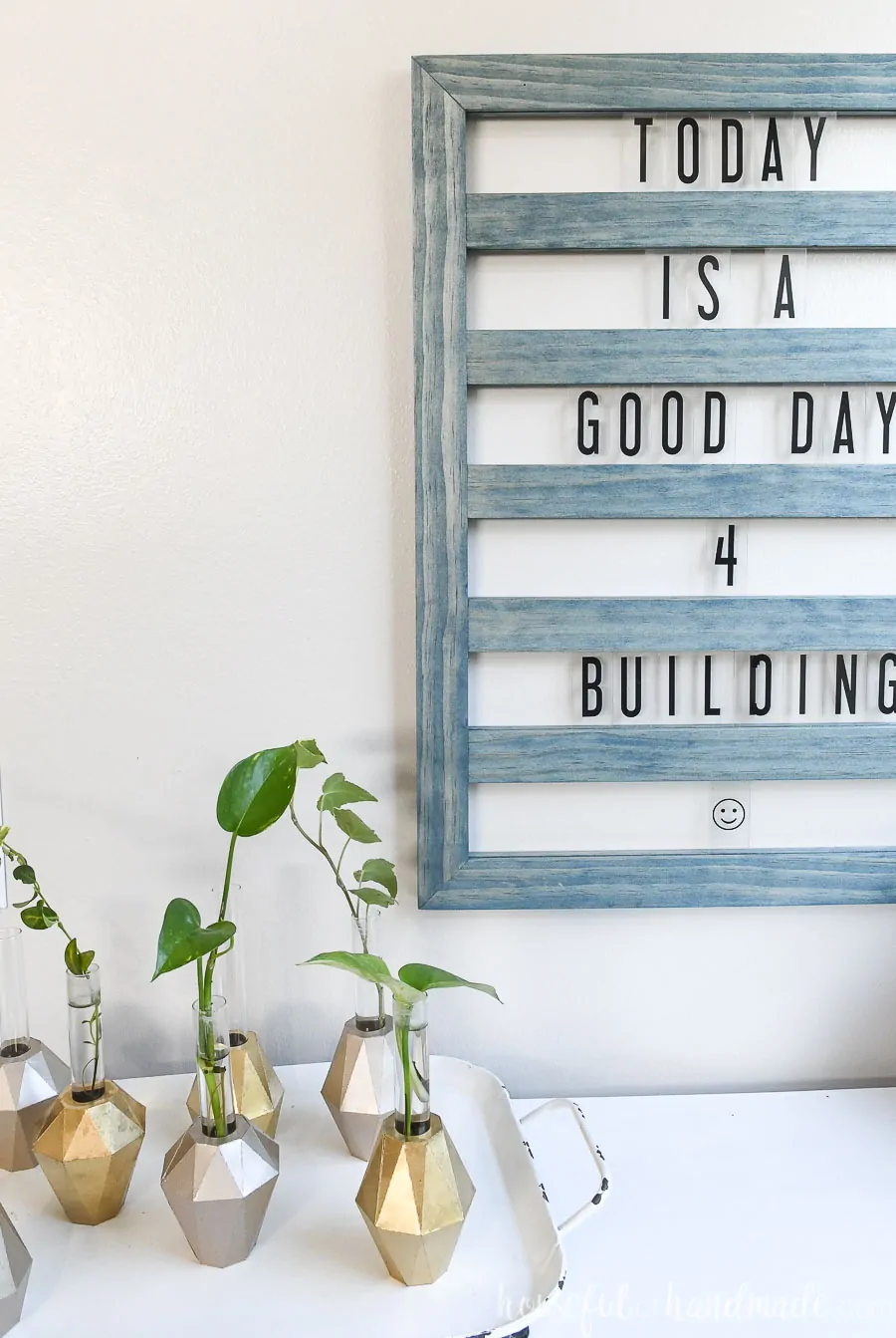 Close up of the sliding letter board with the words "Today is a good day 4 building" showing on it. 