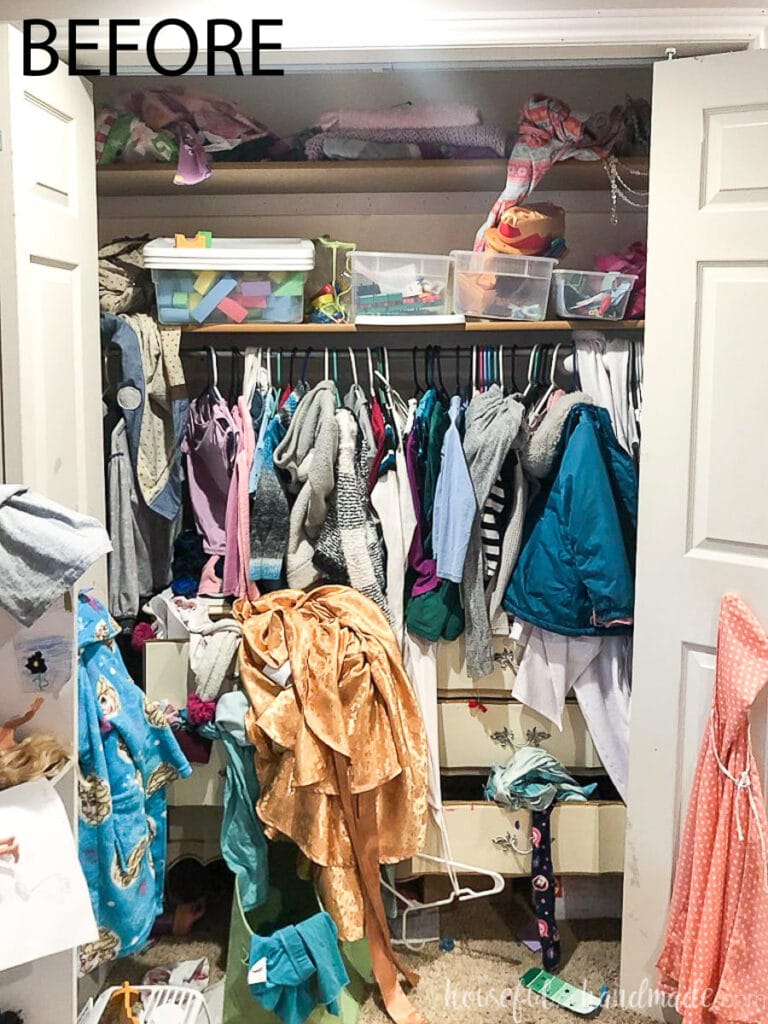 Before photo of the kids closet before the storage and organization makeover.