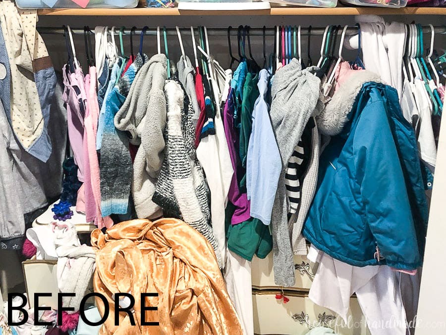 Top of the dresser in the closet showing how it is not great for being able to organize the space, before the closet makeover. 