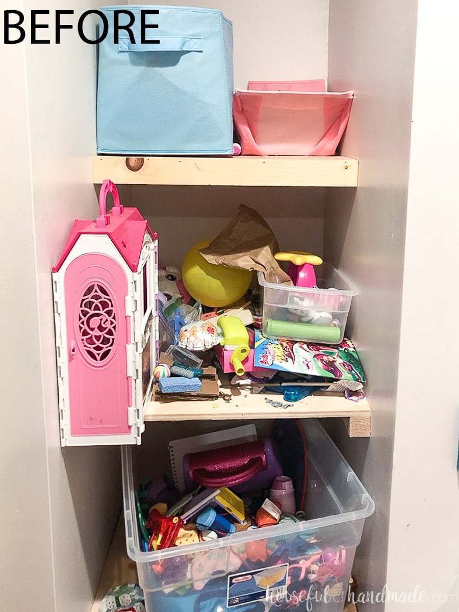 Before photo of the storage shelf nook next to the closet.