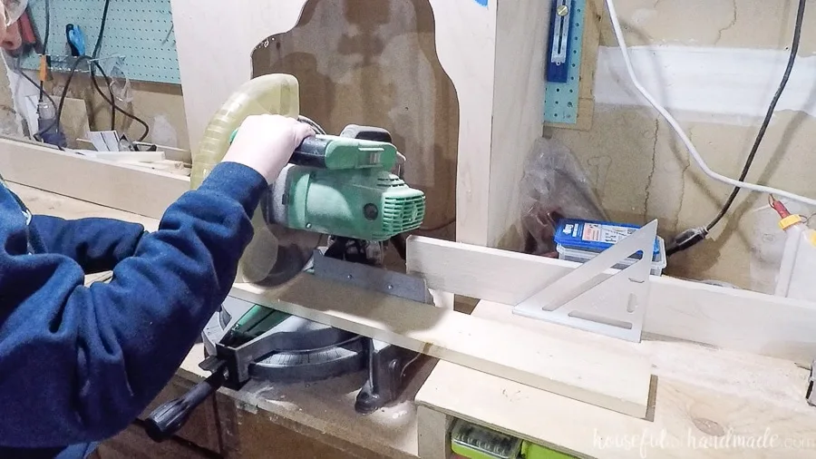 Cutting 1x4 boards at the miter saw.