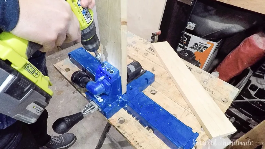 Drilling pocket holes with the Kreg K5 pocket hole jig. 