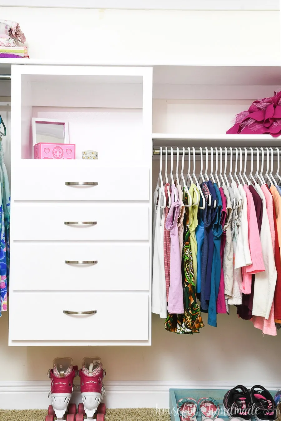 Closet organization system added to the clothing closet for more storage. 