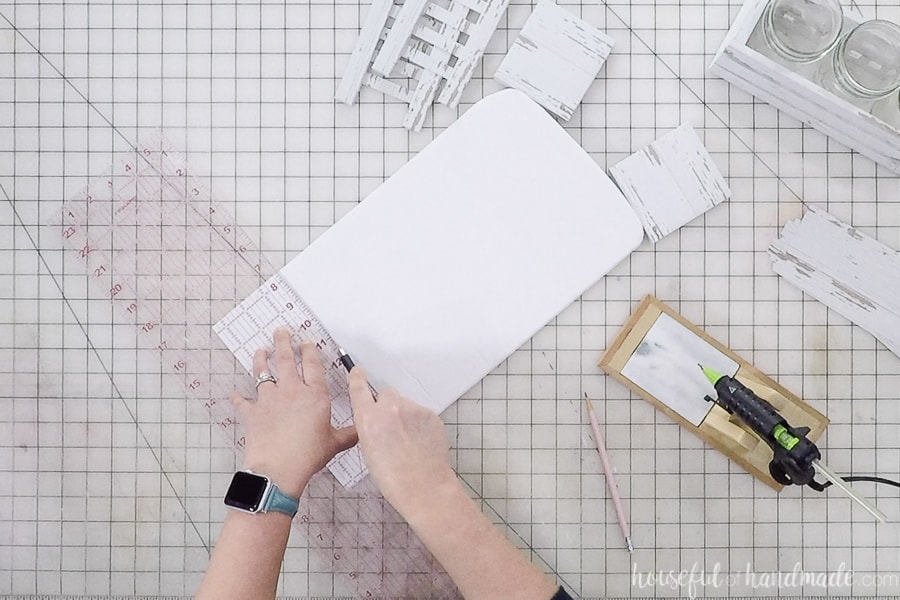 Using and exact knife to cut the foam board for the bottom.