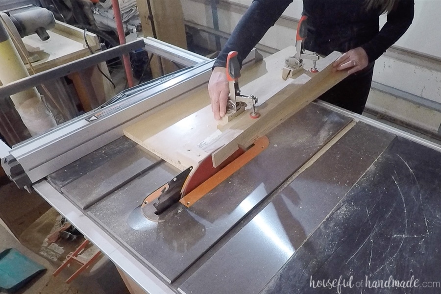 Cutting off the first taper with the table saw and the tapered leg jig.