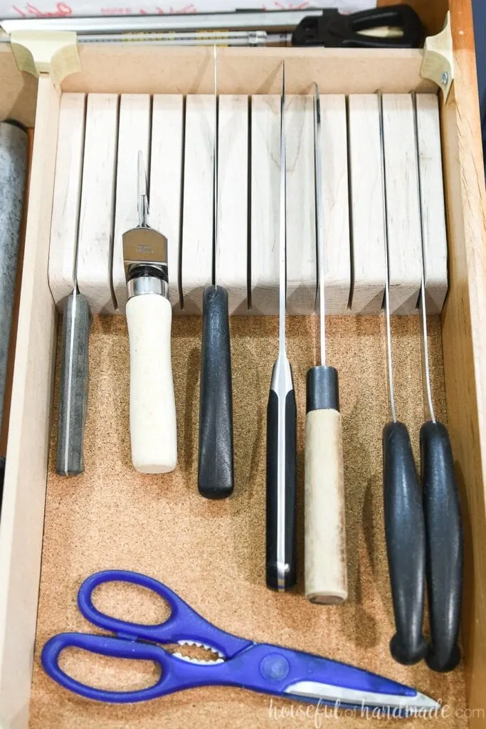 Close-up view of the finished knife block inside the organized drawer. 