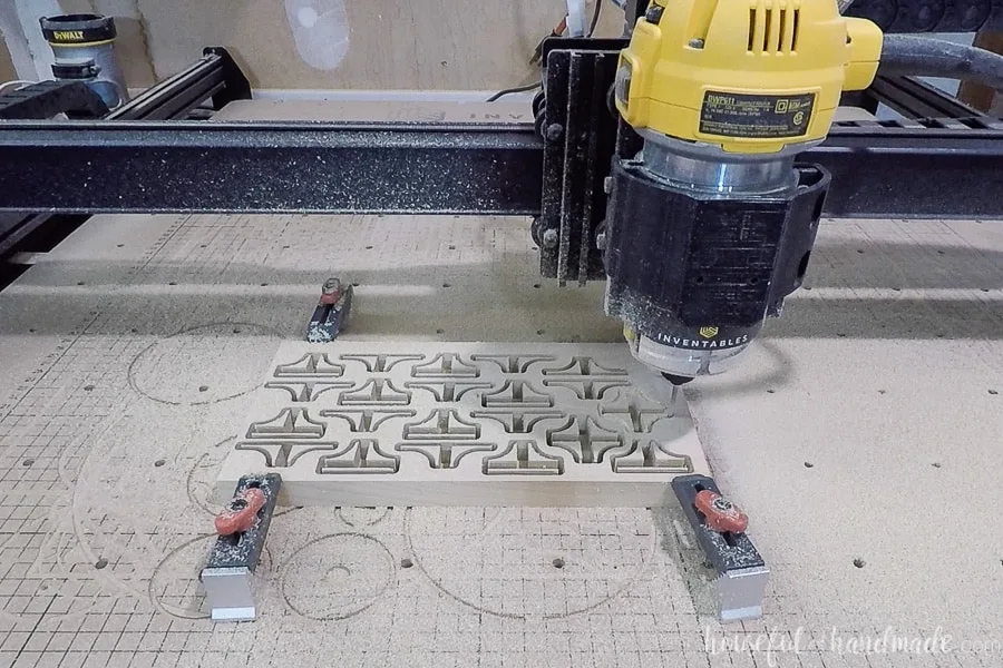 Wood clips for the drawer organization system being carved from scraps of wood with the X-carve CNC machine.