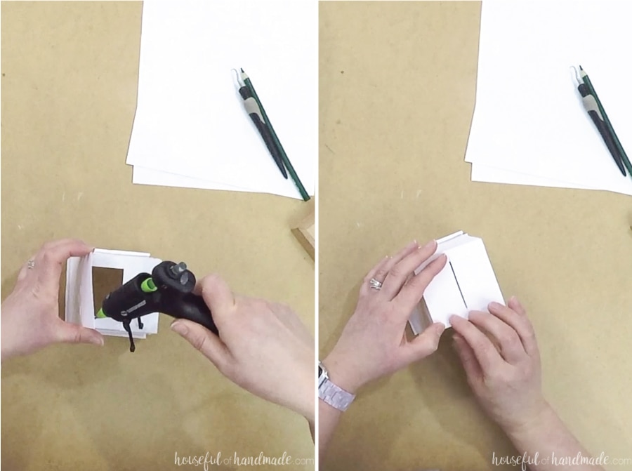 Glueing the tabs on the bottom to close up the bucket. 