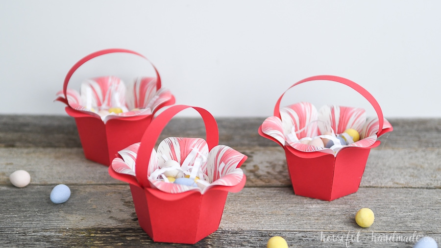 Side view of the flower shaped baskets holding Easter treats.
