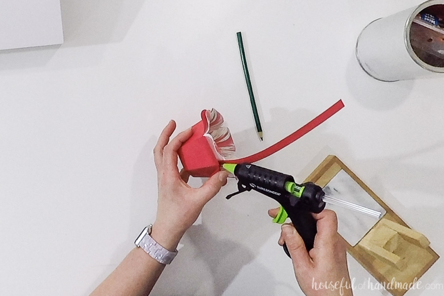 Attaching the paper Easter Basket handle.