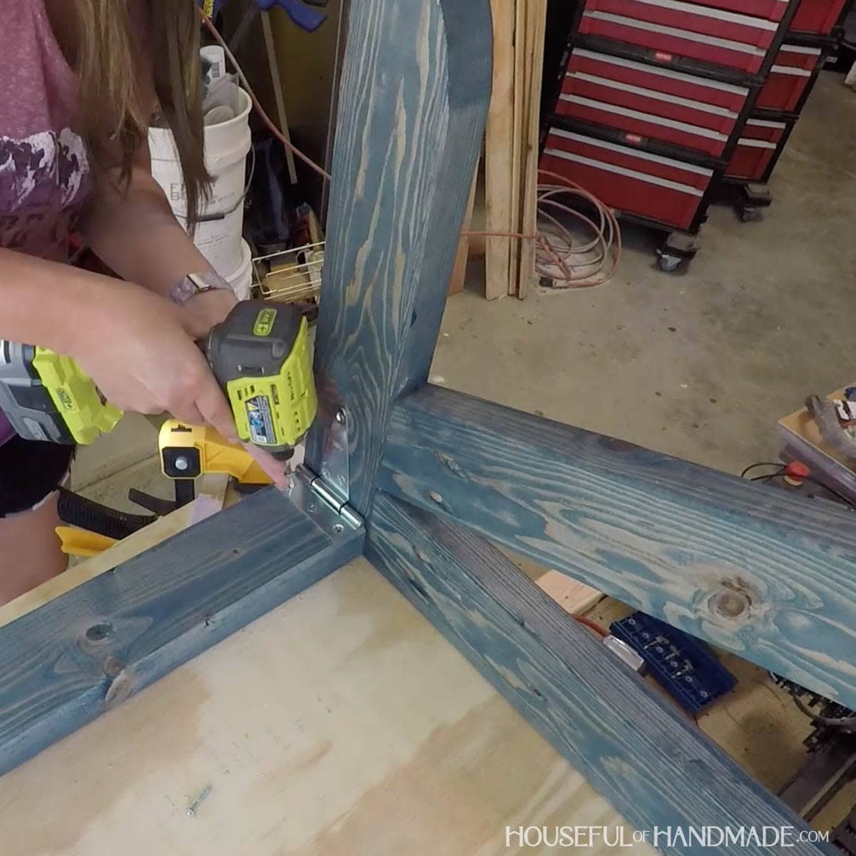 Adding t-hinges to desk frame.