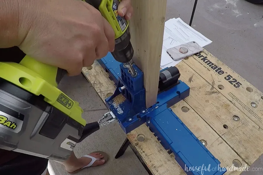 Drilling pocket holes to assemble the outdoor chair. 