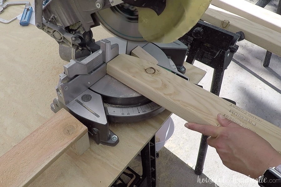 Cutting the angle off the back pieces for the outdoor chair seat back.